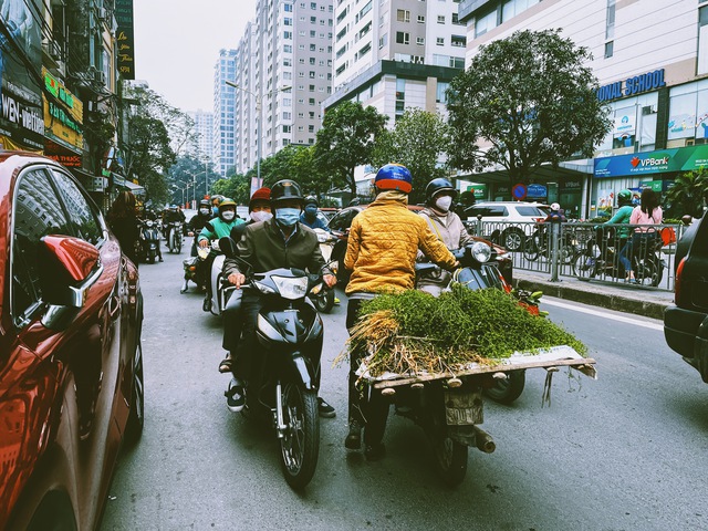 Tắm nước mùi ngày 30 Tết, mừng tuổi trẻ con bằng quả cam để lấy khước đầu năm mới: Tục xưa trong Tết nay có còn nguyên vẹn? - Ảnh 3.