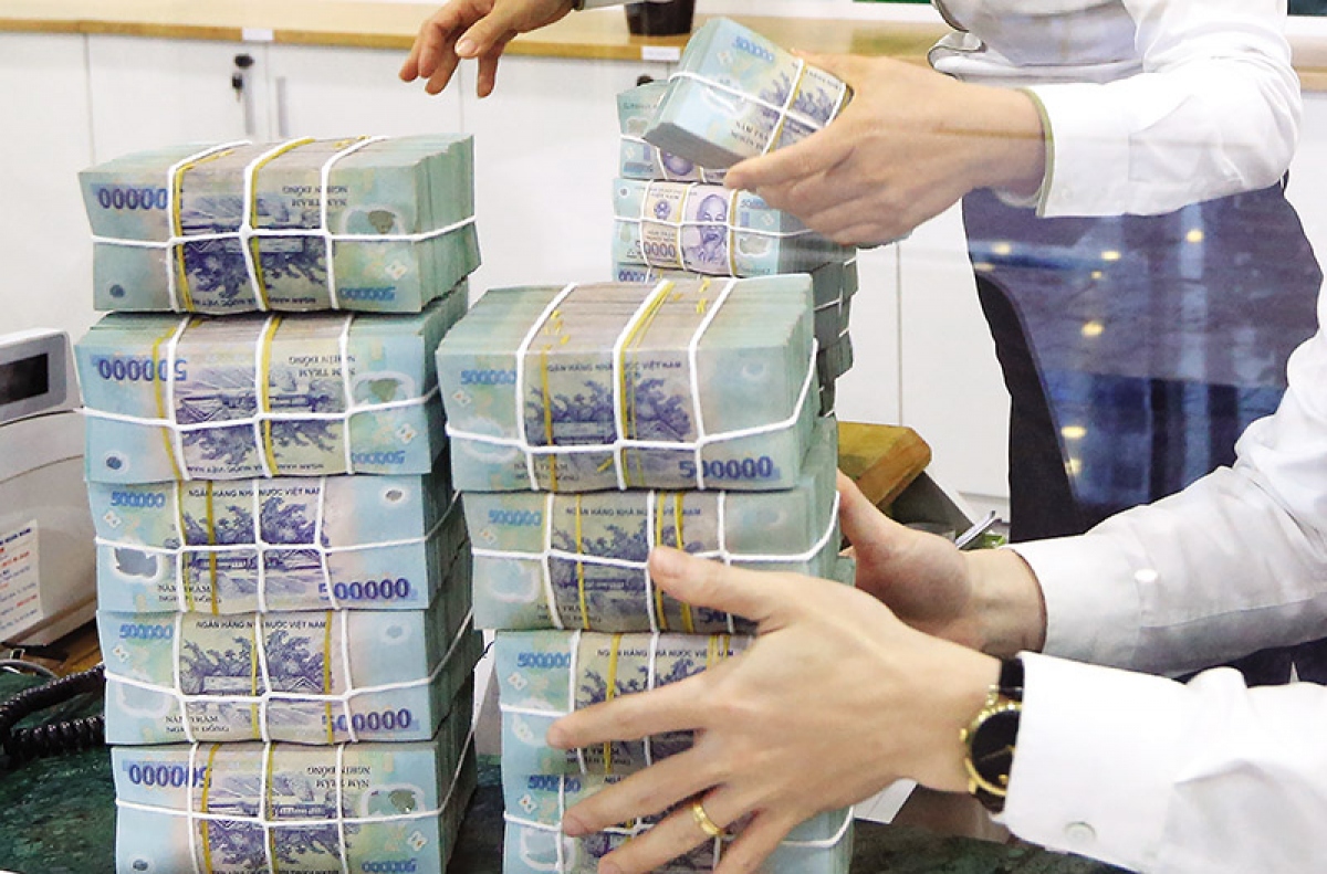 Giữ vững ổn định thị trường tài chính tiền tệ trong bối cảnh nhiều biến động - Ảnh 1.