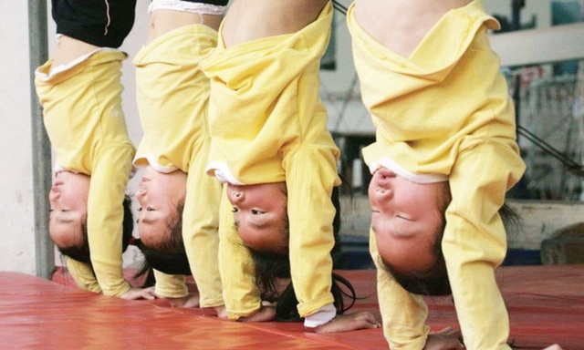 Giấc mơ vô địch Olympic của những đứa trẻ ở lò đào tạo thể thao Trung Quốc: Đánh đổi tuổi thơ bằng máu, mồ hôi và nước mắt - Ảnh 9.