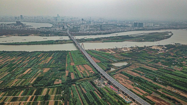 [Photo Essay] Đông Anh chuẩn bị lên quận, giá nhà đất vẫn im lìm - Ảnh 1.