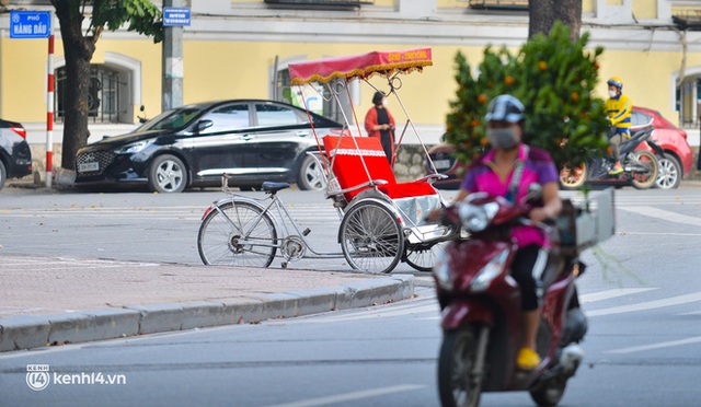 Hồi ức của người đạp xích lô về những ngày Tết chưa có dịch Covid-19: Người dân đi chơi kín hồ Gươm, chở không kịp khách - Ảnh 9.