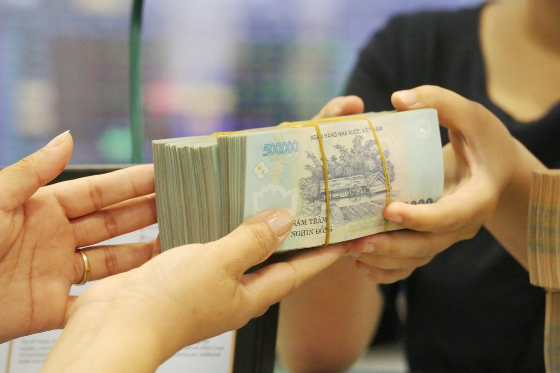 Mở rộng tín dụng bằng mọi cách có thể gây ra nhiều hệ lụy xấu - Ảnh 3.