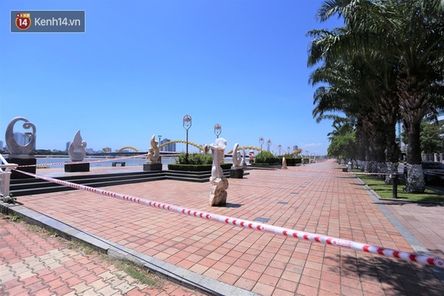 Toàn cảnh Đà Nẵng ngày đầu cách ly xã hội: Bãi biển không bóng người, bến xe dừng hoạt động - Ảnh 22.