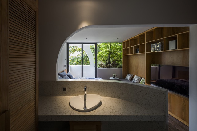 Ngôi nhà cắt khoét siêu art chiếm spotlight cả khu phố: Design bên trong xịn không kém, sân thượng chill như quán cafe - Ảnh 15.